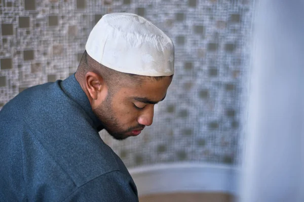 Religious praying in a mosque